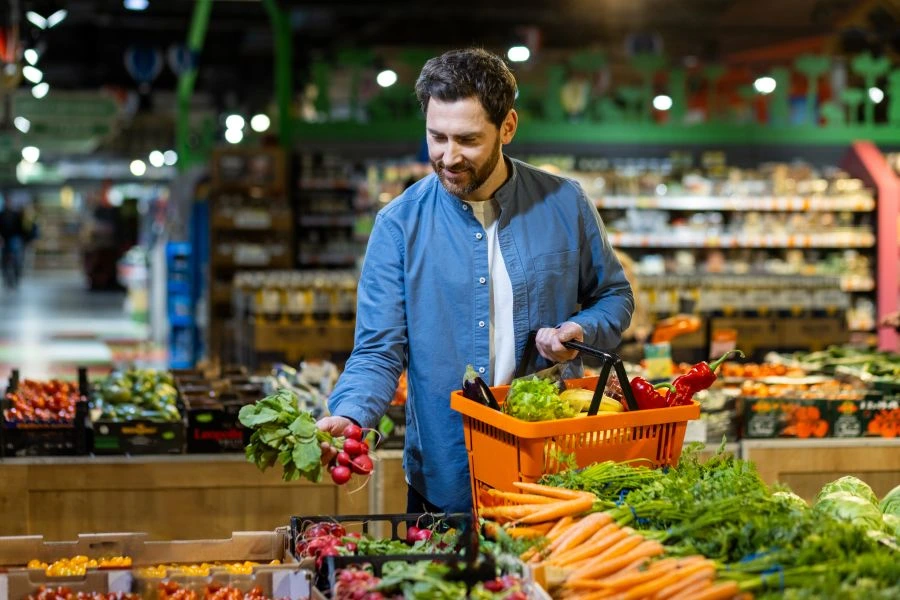 Man buying vegetables